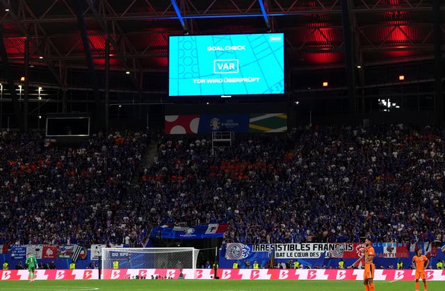 A large screen showing a VAR check which ruled out Xavi Simons' strike in the second half for the Netherlands