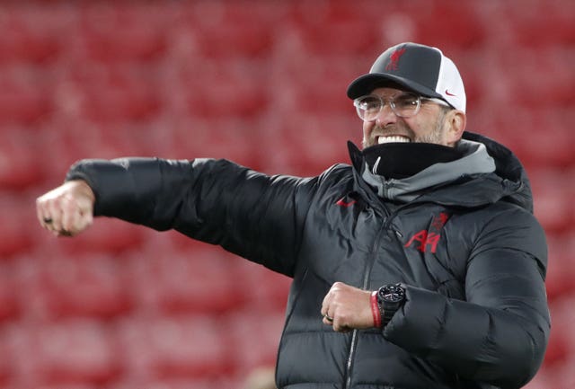 Liverpool manager Jurgen Klopp punches the air in celebration