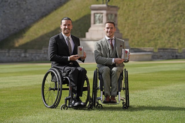 Wheelchair tennis players Gordon Reid and Alfie Hewett with their OBE insignia 