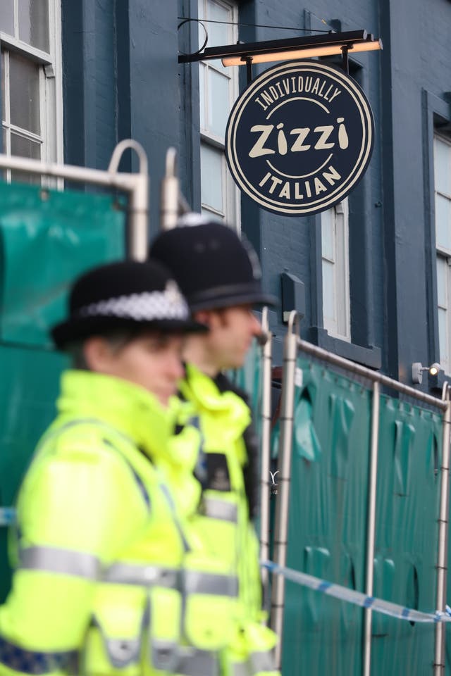 Police officers on duty outside a Zizzi restaurant in Salisbury (Andrew Matthews/PA)