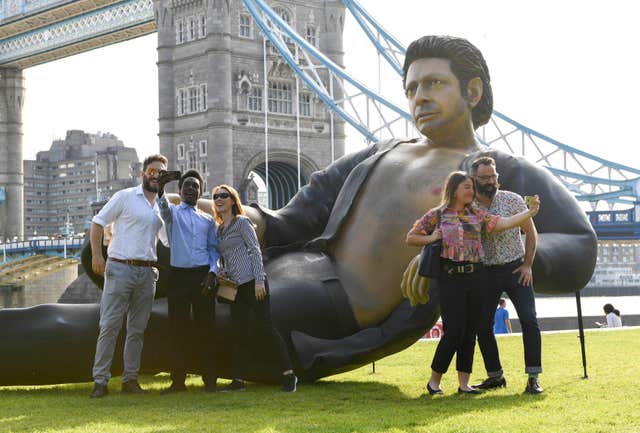 Commuters take selfies with a 25ft statue of Jeff Goldblum’s torso