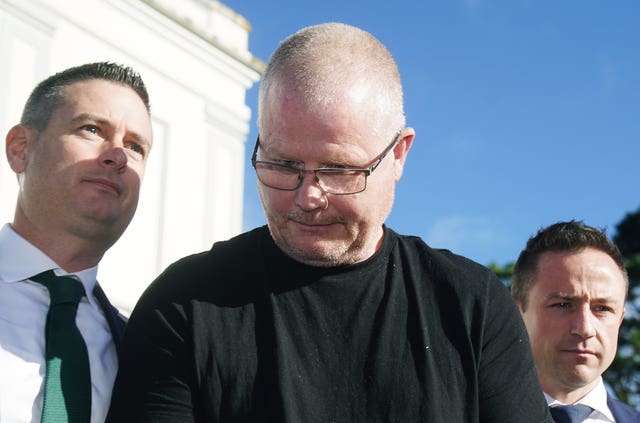 Richard Satchwell (centre) leaving the District Court in Cashel, Co Tipperary