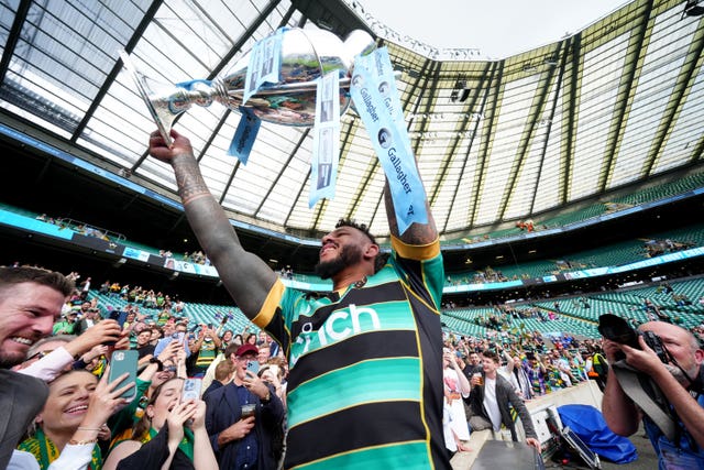 Courtney Lawes lifts the Premiership trophy at Twickenham