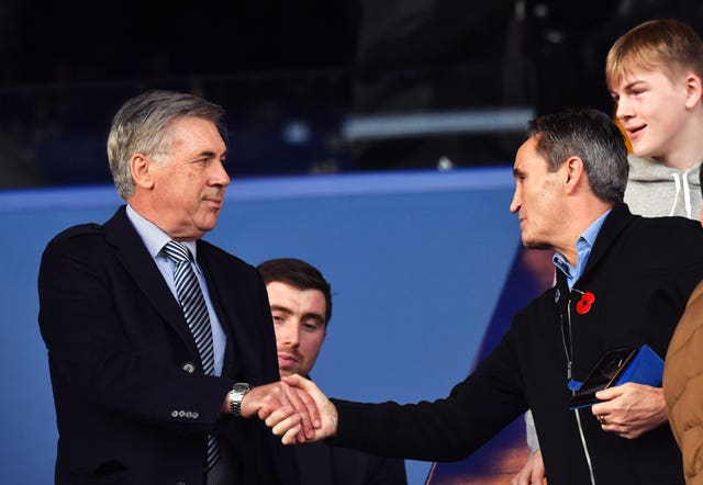 Carlo Ancelotti (left) was at the match against Arsenal on Saturday