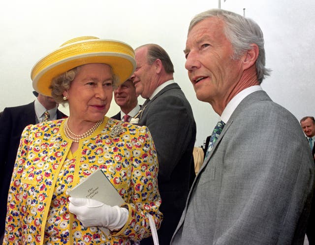 The Queen and Lester Piggott view the 'Lester Piggott Gates' at Epsom on Derby day, 1996