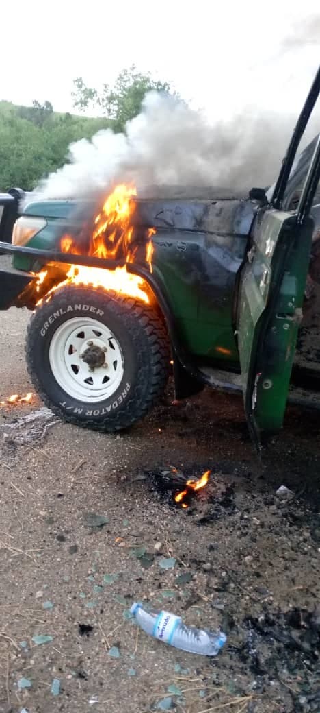 The vehicle in which a British man, his South African wife, and their Ugandan guide were driving through Queen Elizabeth National Park on Tuesday