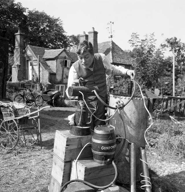 Black and white image of Dick Van Dyke as Caractacus Potts in Chitty Chitty Bang Bang