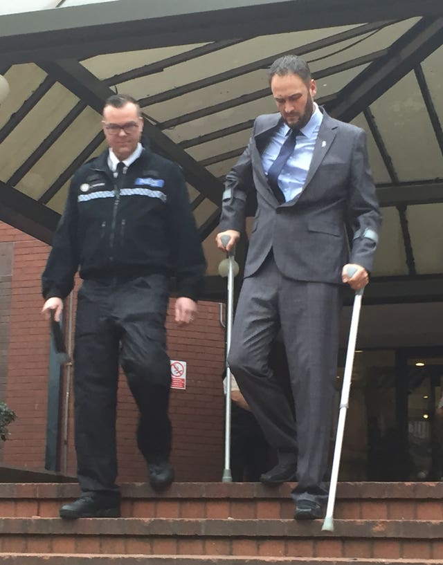 Supt Dave Twyford, head of road policing at West Midlands Police, leaves Birmingham Crown Court alongside Pc Gareth Phillips 