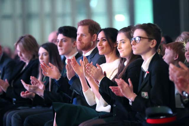 Harry and Ms Markle attended an event to mark youth-led peace-building initiative Amazing the Space (Niall Carson/PA)