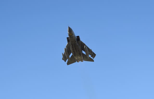 A final flypast of a single Tornado aircraft over RAF Marham