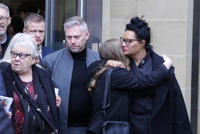 Mourners, including Harvey Willgoose’s mother Caroline Willgoose (right) after the funeral