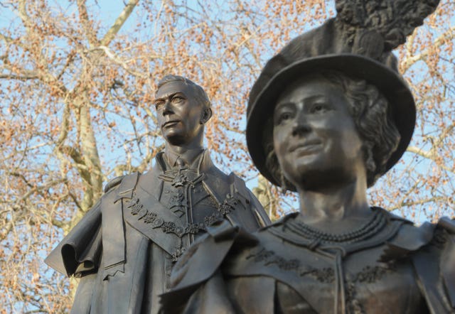 The statues of George VI and Elizabeth the Queen Mother in London (PA)