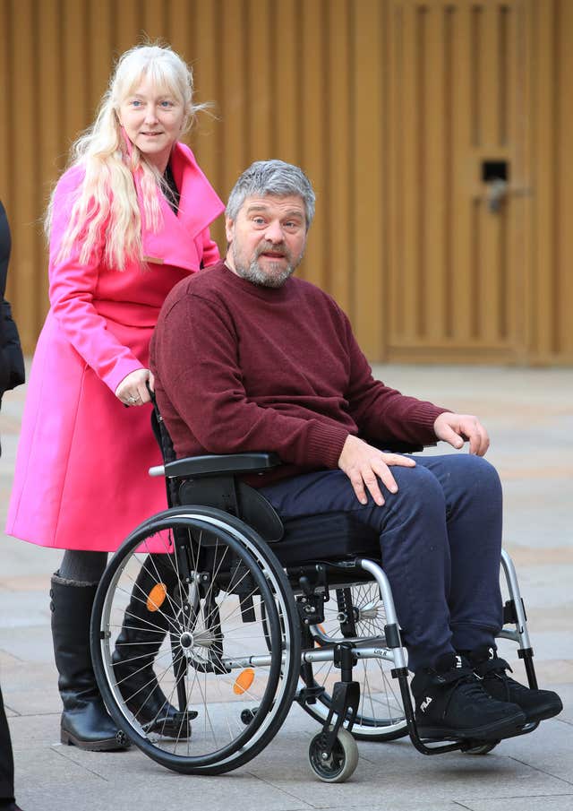 Paul Holroyd at Liverpool Crown Court with partner Allison Wynne (Peter Byrne/PA)