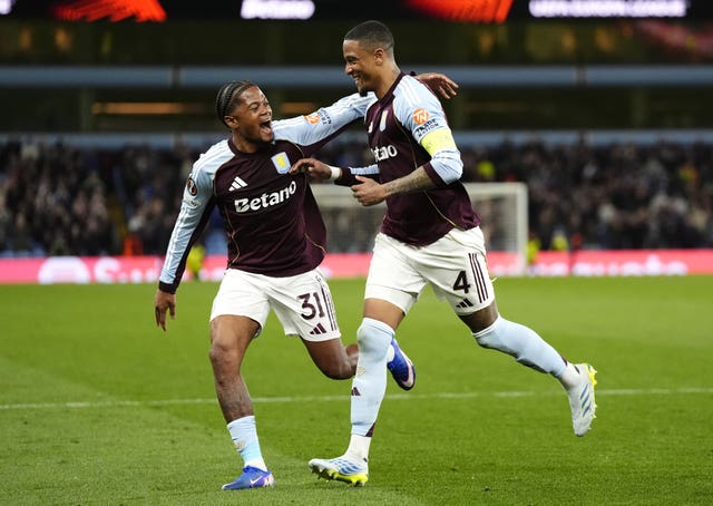 Ezri Konsa celebrates