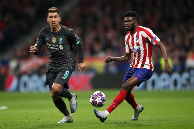 Thomas Partey (right) has been linked with a move to Arsenal from Atletico Madrid.