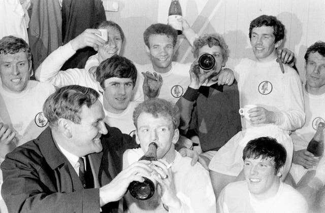 The Leeds players celebrate their 1969 League Championship success with champagne and cigars in the dressing room after a 0-0 draw at Liverpool (back row, left to right) Mick Jones, Jack Charlton, Paul Reaney, Gary Sprake, Johnny Giles, Paul Madeley; (front row) manager Don Revie, Peter Lorimer, Billy Bremner, Eddie Gray