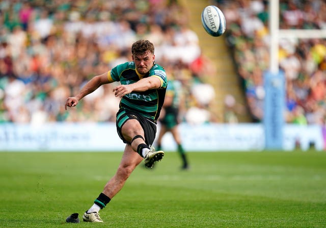 George Furbank kicks at goal for Northampton