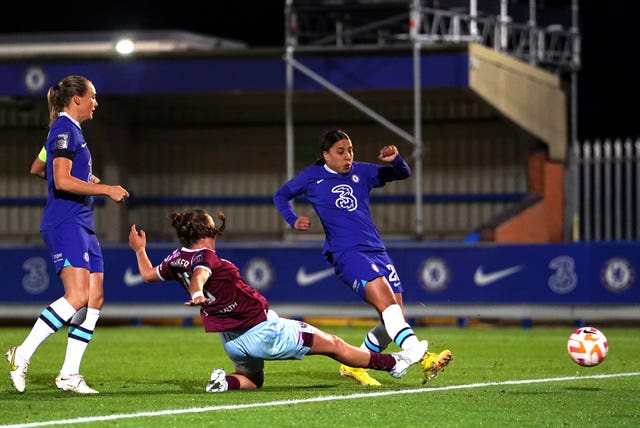 Chelsea’s Sam Kerr (right) scores against West Ham