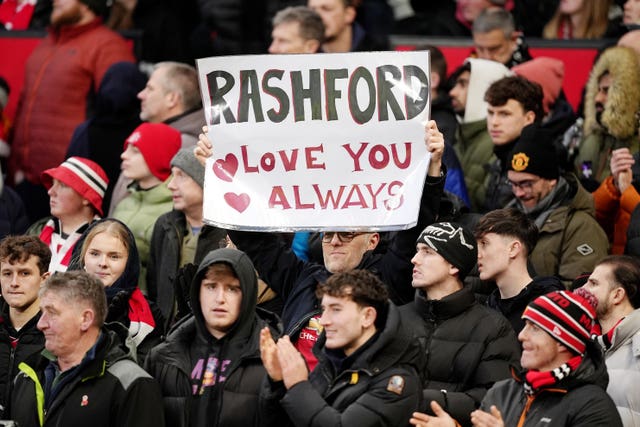 A Manchester United fan holds up a sign in support of Marcus Rashford during the Premier League match at Old Trafford,