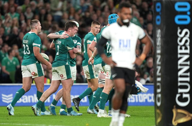 Gus McCarthy celebrates scoring Ireland's sixth try