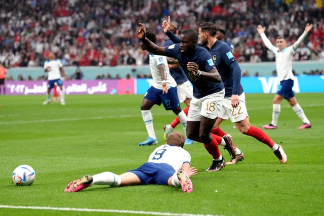 Harry Kane went down under a challenge from Dayot Upamecano