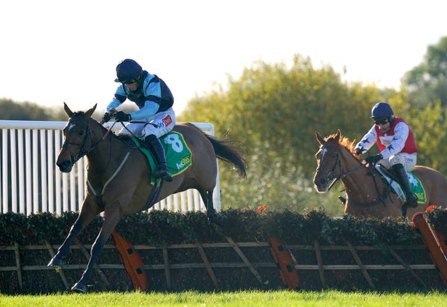 ndefatigable ridden by jockey Daryl Jacob (left) clears a hurdle on their way to winning the bet365 Hurdle at Wetherby racecourse in October 2021