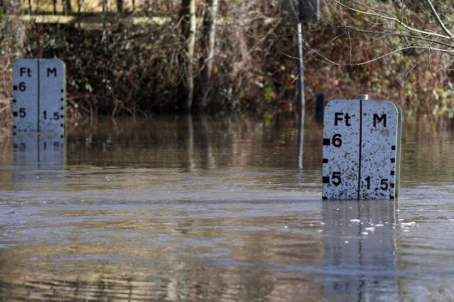 The water level reaches nearly 5 feet at a ford near Charvil, Berkshire, as after flooding affected parts of the country (Steve Parsons/PA)
