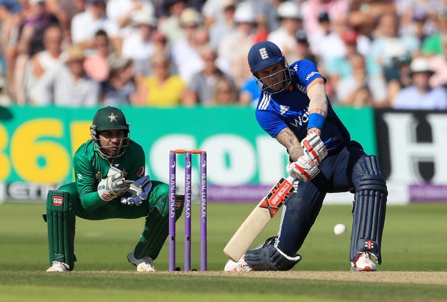 Alex Hales, right, hits out, watched by Pakistan wicketkeeper Sarfraz Ahmed