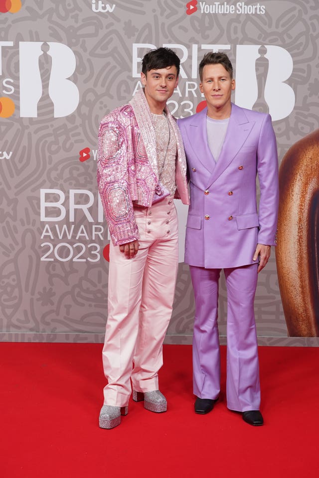 Tom Daley and his partner Dustin Lance Black attending the Brit Awards 2023 at the O2 Arena, London 