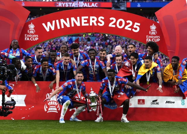 Crystal Palace players celebrate with the trophy