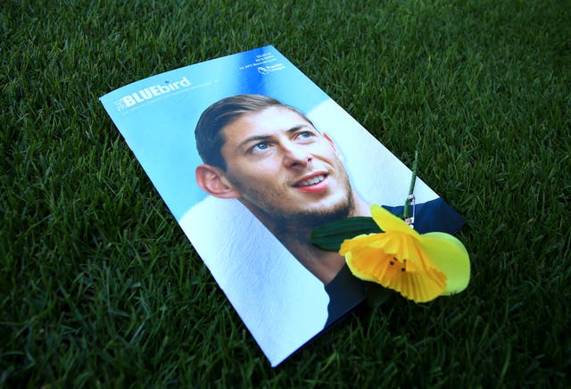 A football programme with an image of Emiliano Sala on the cover (Mark Kerton/PA)