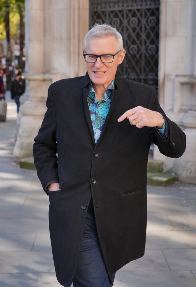 Jeremy Vine walking outside the Royal Courts of Justice