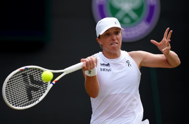 Iga Swiatek hits a forehand