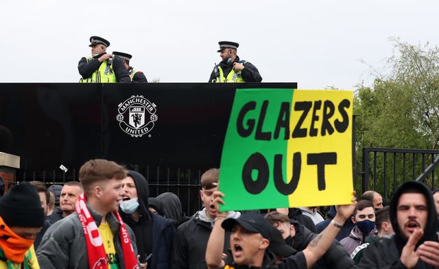 Manchester United fans protesting against their owners