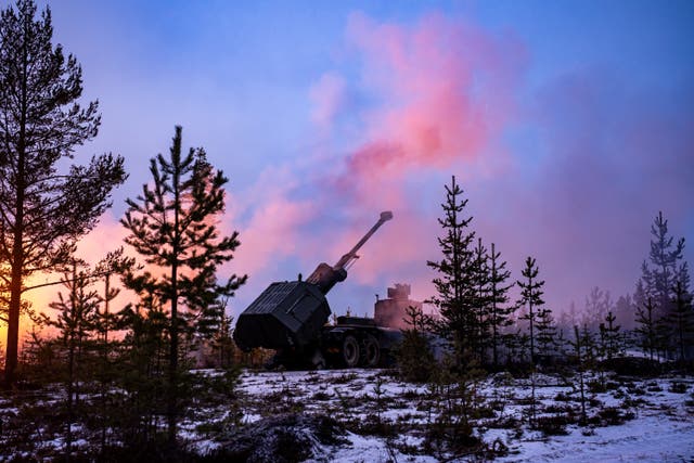 Smoke fills the air during live firing of the British Army’s new Archer Mobile Howitzer gun (Ben Birchall/PA)