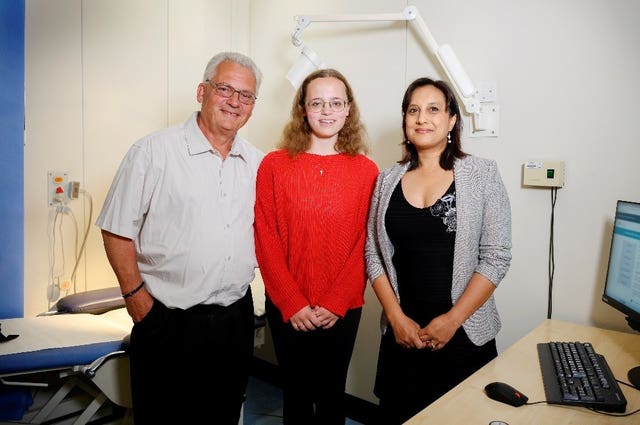 Mary, centre, and her father, Jimmy Catchpole with Dr Anita Chandra