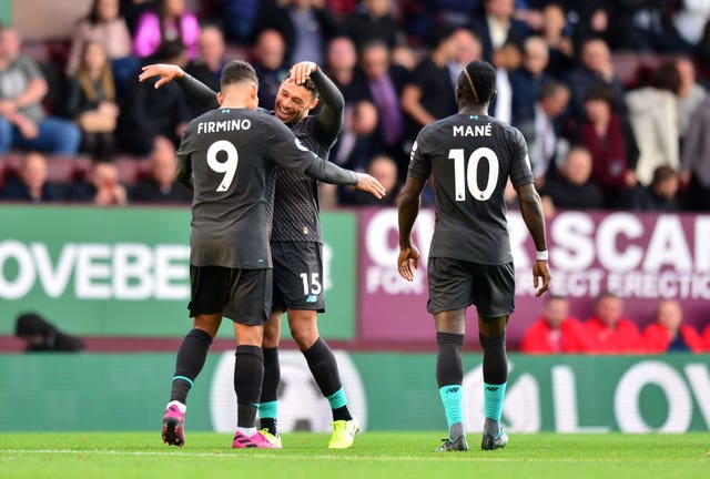 Roberto Firmino, left, and Sadio Mane celebrate in the win over Burnley