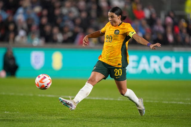 Australia's Sam Kerr scores against England