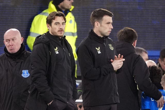 Everton caretaker managers Leighton Baines, left, and Seamus Coleman watch from the sidelines