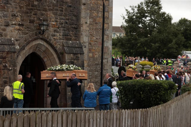The coffins are taken into St Mary’s Church in Maguiresbridge 