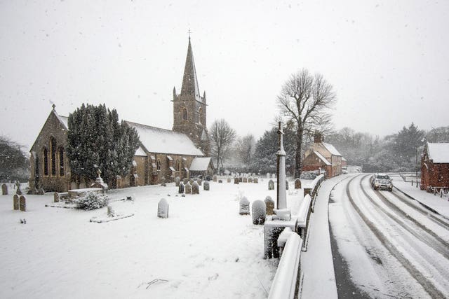 Snow falls around St Edmund King & Martyr Church in Tendring