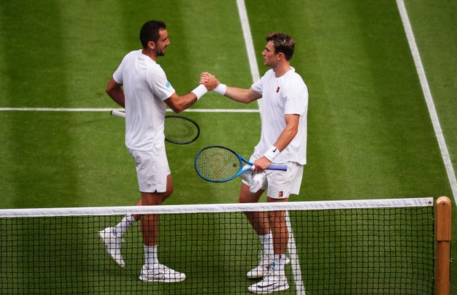 Jack Draper, right, was beaten by Marin Cilic 
