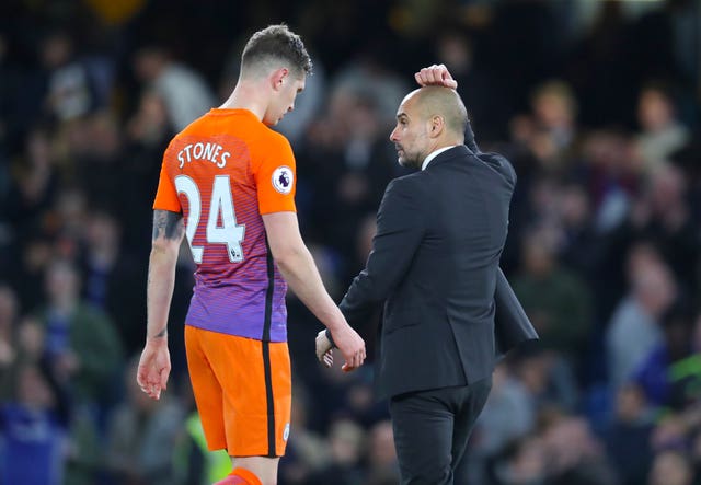 John Stones and Pep Guardiola