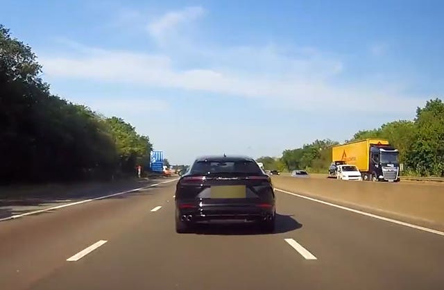 Police dashcam video showing former England footballer Raheem Sterling driving a Lamborghini Urus dangerously on the motorway