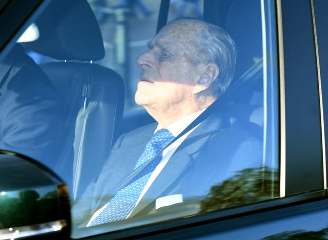 Philip sat in the front passenger seat for the drive to the lunch. Joe Giddens/PA Wire