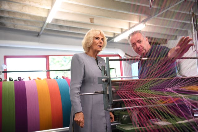 Camilla is shown a loom at Avoca Mill