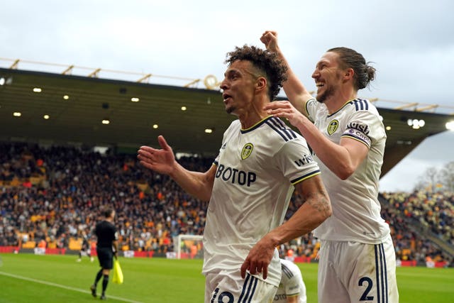 Rodrigo, left, celebrates his goal