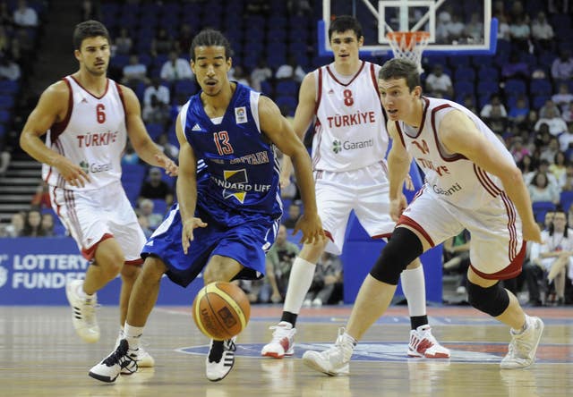 Great Britain's Justin Robinson (centre) in action at the O2 Arena, London.