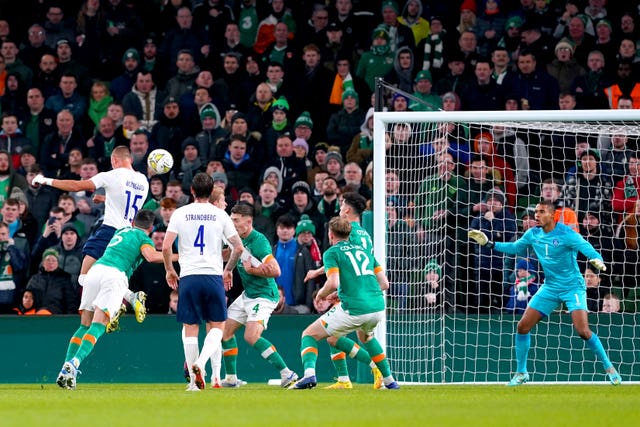 Leo Ostigard (left) heads Norway in front at the Aviva Stadium