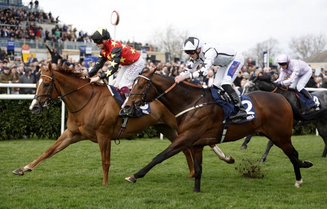 Montassib (left) winning the Cammidge Trophy at Doncaster